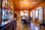 Main Level Living Room Features Ample Seating, Gas Fireplace, Flat Screen TV, and Beautiful Views of Lake Blue Ridge